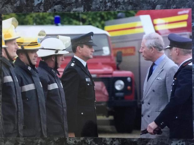 Isle of Wight County Press: Julian Fountaine meeting Prince Charles at Ryde Fire Station.