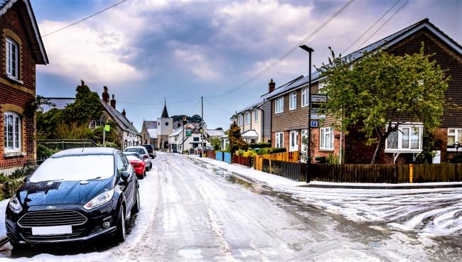 Looks like a day in December, but this was Newchurch village at lunchtime today (Saturday) after it was hit by a freak hailstorm.  Photos courtesy of the Isle of Wight Met Service.