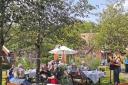 Accordionist Debbie Murphy entertains residents and visitors on the first of Brook View’s two open afternoons