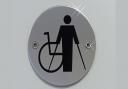 A disabled toilet sign.