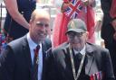 Island war veteran Roy Hayward with Prince William.