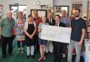 Shanklin and Sandown Mayors present Warm Space cheque to Shanklin Age Concern volunteers