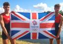 Louis Sheasby and Carter Horrix celebrate winning rowing gold in France.