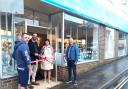 At the opening of the shop, from left: Sandown mayor, Cllr Alex Lightfoot and Fran Pauwels, flanked by friends Mark Follon, left, and John Mather.