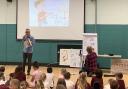 Poet John Hegley and illustrator Neal Layton at a school