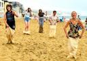 Action from the ladies' sack race