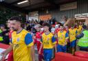 Newport and Aldershot walk out onto the field.