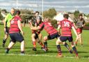 IWRFC (with the ball) in action against United Services Portsmouth at Wootton Rec on Saturday.