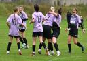 The team celebrates with goalscorer Georgie Dye, number two