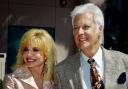 Jack Jones, pictured with Loni Anderson, has died (Reed Saxon/AP)