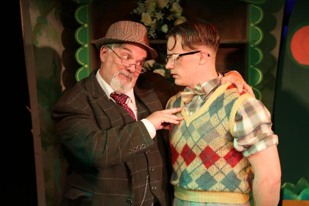 Mr Mushnik (Kevin Gauntlett) and Seymour (Sam Webber) in Little Shop of Horrors by the Mitre Players.