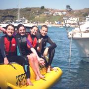 Grace Argyle (14), Ellie Tasker(14), Jess Atkins(15) and Tom Isaacson(14) will circumnavigate the Isle of Wight on an inflatable banana for KissyPuppy.