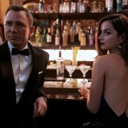 Daniel Craig as James Bond and Ana de Armas as Paloma. Credit:PA