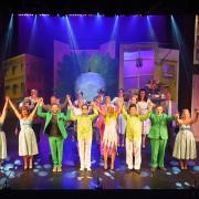 The full cast of Little Shop of Horrors during the finale. Photo by Rodger Hooper.