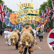 Joe Plumb leads the Queen's Beasts section. Picture by Jubilee Pageant / Press Association.