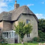 This rural cottage in Kingston on the Isle of Wight has been sold at auction by Clive Emson Auctioneers.