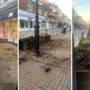 Damage has been done to flowers in planters outside Boots in Newport.