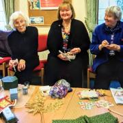 Ann Radcliffe, Ruth Williams and Sheila Williams preparing their crafts
