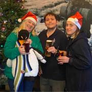 Jean fuller, Aaron Harris, Angel Harrison and Freddie the Falklands penguin at the Veteran Hotel and Bar in Ryde.