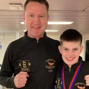 Isle of Wight boxer Bobby Mills with head coach Mike Voisey.