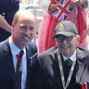 Island war veteran Roy Hayward with Prince William.