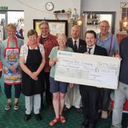 Shanklin and Sandown Mayors present Warm Space cheque to Shanklin Age Concern volunteers