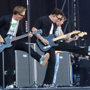McFly performing on the Main Stage of the Isle of Wight Festival.