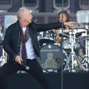 Jim Kerr from Simple Minds on stage at Isle of Wight Festival 2024.