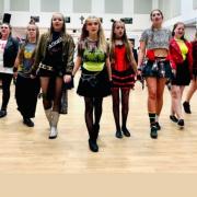 TheatreTrain students rehearsing for We Will Rock You