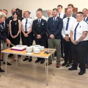 IW Lord Lt, Susie Sheldon, cutting a special cake to mark the presentation of the King's Award to Sandown and Shanklin Independent Lifeboat.