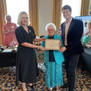 Sue Biss, IW WI Federation chair, WI stalwart Valerie Andrew, and G4 star Mike Christie