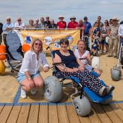 At the front from left, RTC projects officer Annette Johansson-Steed, #GoLiveGranny Lyn Blackledge and Unlimited Island founder Claire Walker, with various stakeholders, sponsors and notable Island figures standing behind