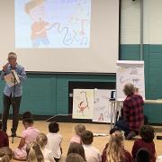 Poet John Hegley and illustrator Neal Layton at a school