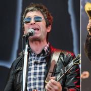 Noel and Liam Gallagher performing at Isle of Wight Festival