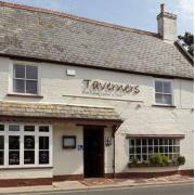 The Taverners pub in Godshill and current owners Tim and Emma Foster