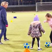 Women and girls, as young as five, are being encouraged to play football at two new centres on the Island.