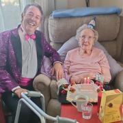 Song and dance entertainer Maurice Kachuk with 102-year-old Ivy Tucker