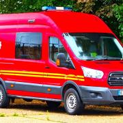 A fire response vehicle parked outside the closed Island fire station.