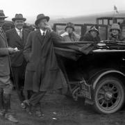 This is almost certainly Monkham racecourse on the downs above the Blacksmith’s Arms in 1927. The race is over and the losing betting slips are on the ground. Time for one last cigarette before heading off home.