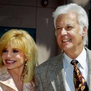 Jack Jones, pictured with Loni Anderson, has died (Reed Saxon/AP)