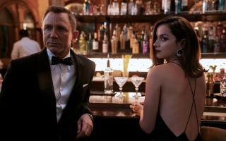 Daniel Craig as James Bond and Ana de Armas as Paloma. Credit:PA