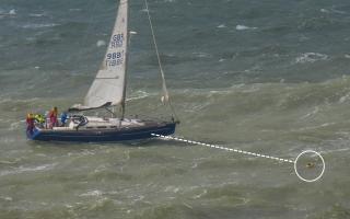 Crew member rescued after falling overboard during Round the Island Race