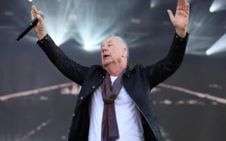 Jim Kerr from Simple Minds on stage at Isle of Wight Festival 2024.