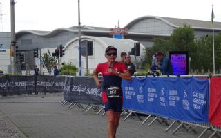 Liz finishing the Cardiff Sprint Triathlon