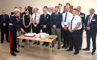 IW Lord Lt, Susie Sheldon, cutting a special cake to mark the presentation of the King's Award to Sandown and Shanklin Independent Lifeboat.