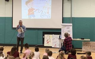 Poet John Hegley and illustrator Neal Layton at a school