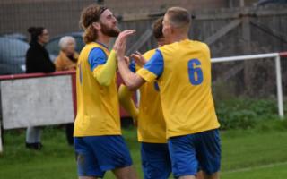 Newport celebrating away at Whitchurch United