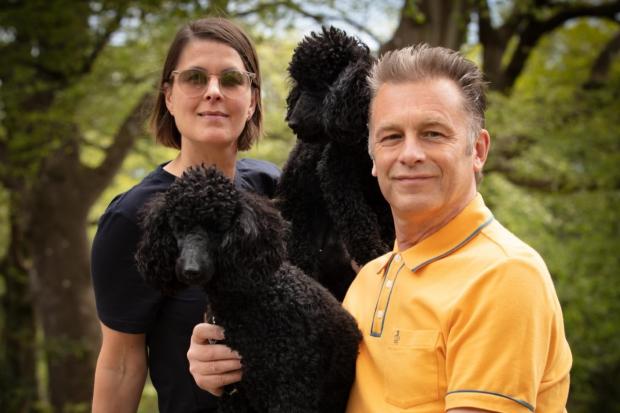 Charlotte Corney and Chris Packham with poodles Sid (front) and Nancy.