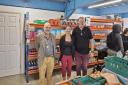 From left to right: Cllr John Nicholson, Monique Gallop and Andy Gallop at the opening of Cowes Community Pantry