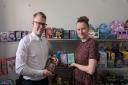 Toytopia owners Billy Saint and Hannah Foote standing inside their new independent toy shop in Woolston.